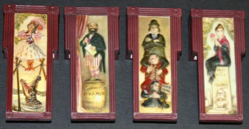 Left to Right - Haunted Mansion's Stretching Portrait "Tightrope" previously released, Haunted Manstion Stretching Portrait Dynamite, Haunted Mansion Stretching Portrait Quicksand, and Haunted Mansion Stretching Portrait Rest in Peace available in May 2009 at the Disney Parks