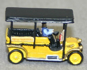 olszewski disneyland main street usa horseless carriage yellow truck