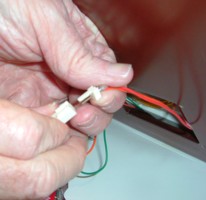 Separating the wire connectors inside the electrical box